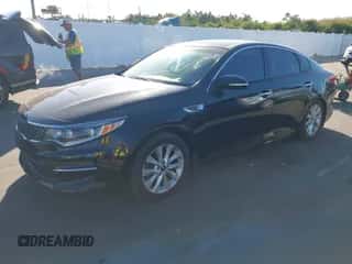 2016 Kia Optima EX with VIN 5XXGU4L33GG053915, listed as a IAAI auction lot 43540697 with 98,283 mi miles and . Bid and sale history available at DreamBid. Image 2.