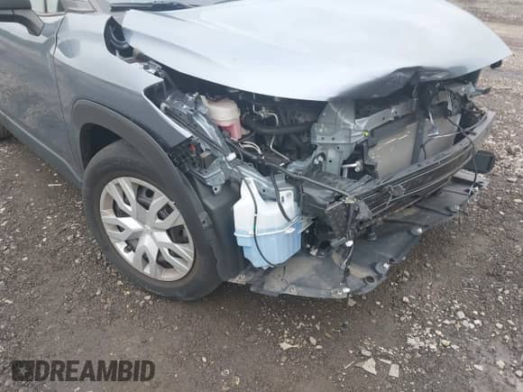 2022 Toyota Corolla Cross L with VIN 7MUAAABG0NV024424, listed as a IAAI auction lot 42261227 with 20,171 mi miles and . Bid and sale history available at DreamBid. Image 17.