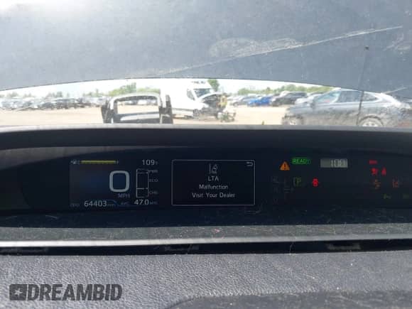 2022 Toyota Prius L Eco with VIN JTDKAMFU5N3160758, listed as a IAAI auction lot 42699871 with 64,403 mi miles and . Bid and sale history available at DreamBid. Image 7.