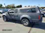 2001 Nissan Frontier SE Desert Runner with VIN 1N6ED26T31C312110, listed as a Copart auction lot 80904815 with 281,926 mi miles and Salvage title. Bid and sale history available at DreamBid. Image 2.