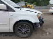 2014 Dodge Grand Caravan American Value with VIN 2C4RDGBG7ER340581, listed as a IAAI auction lot 42673357 with 106,997 mi miles and . Bid and sale history available at DreamBid. Image 18.