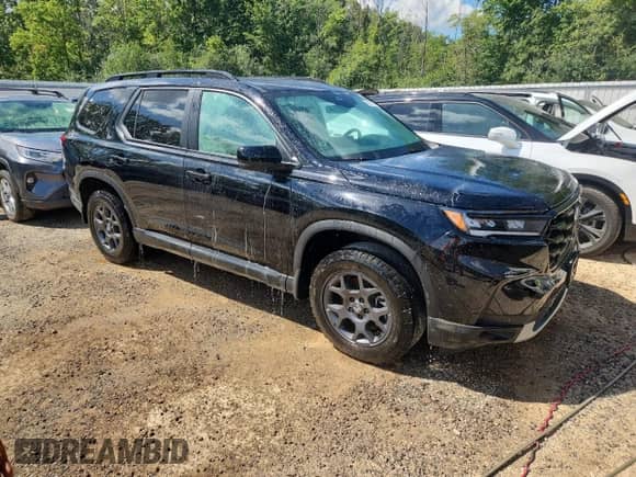 2023 Honda Pilot TrailSport с VIN 5FNYG1H60PB005904, выставлен на аукционе Copart как лот 69937665 с пробегом 43 619 миль миль и На запчасти • Non repairable. История ставок и продаж доступна на DreamBid. Изображение 4.