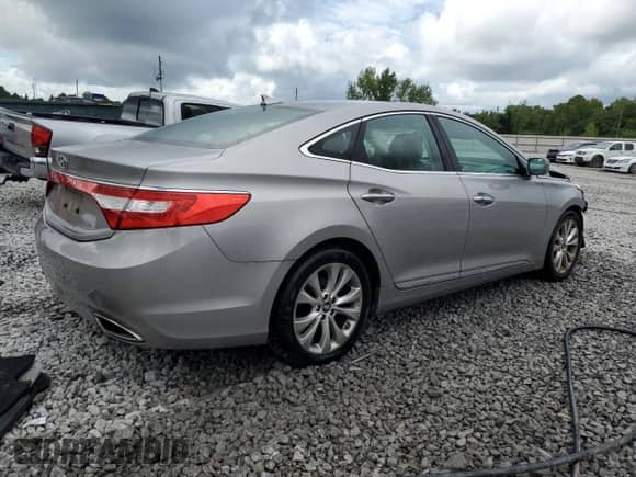 2013 Hyundai Azera с VIN KMHFG4JG0DA247197, выставлен на аукционе Copart как лот 68671165 с пробегом 68 175 миль миль и Списание • Salvage title. История ставок и продаж доступна на DreamBid. Изображение 3.