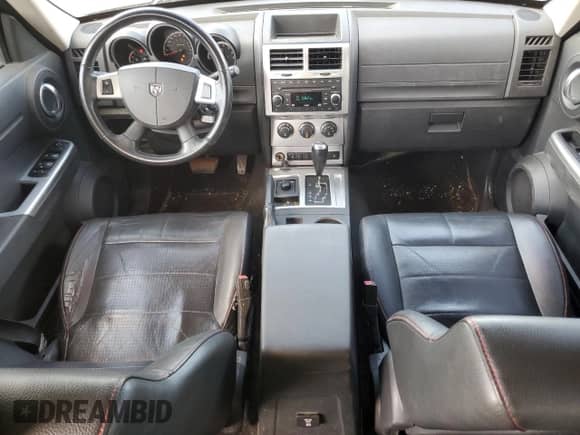 2007 Dodge Nitro R/T with VIN 1D8GU58687W650079, listed as a Copart auction lot 67726854 with 174,152 mi miles and Salvage title. Bid and sale history available at DreamBid. Image 8.