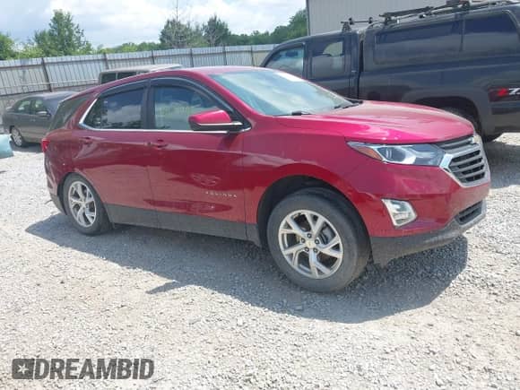 2021 Chevrolet Equinox LT z VIN 2GNAXUEV0M6154000, wystawiony jako IAAI lot #42657911 z przebiegiem 64 765 mil mil oraz . Historia ofert i sprzedaży dostępna na DreamBid. Obrazek 1.
