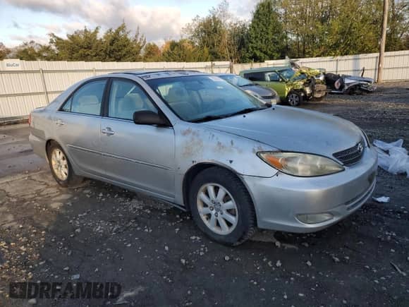 2003 Toyota Camry XLE с VIN 4T1BE30K63U237226, выставлен на аукционе Copart как лот 86869975 с пробегом 187 039 миль миль и Чистый • Clean title. История ставок и продаж доступна на DreamBid. Изображение 4.