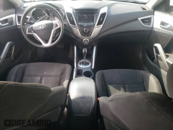 2014 Hyundai Veloster z VIN KMHTC6AD8EU194443, wystawiony jako Copart lot #60059565 z przebiegiem 201 848 mil mil oraz Szkoda całkowita • Salvage title. Historia ofert i sprzedaży dostępna na DreamBid. Obrazek 8.