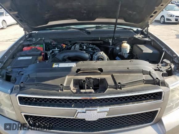 2007 Chevrolet Suburban LS with VIN 1GNFC16077J289579, listed as a Copart auction lot 68528265 with 217,441 mi miles and Salvage title. Bid and sale history available at DreamBid. Image 12.