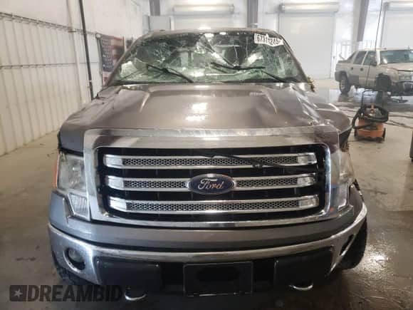 2013 Ford F-150 XLT с VIN 1FTFW1E69DFC80614, выставлен на аукционе Copart как лот 67311245 с пробегом 160 492 миль миль и Списание • Salvage title. История ставок и продаж доступна на DreamBid. Изображение 5.