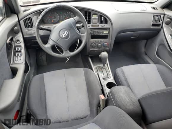 2006 Hyundai Elantra GLS z VIN KMHDN56D86U183512, wystawiony jako Copart lot #56918045 z przebiegiem 247 802 mil mil oraz Szkoda całkowita • Salvage title. Historia ofert i sprzedaży dostępna na DreamBid. Obrazek 8.