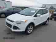 2014 Ford Escape SE z VIN 1FMCU0GX7EUE12884, wystawiony jako IAAI lot #43540995 z przebiegiem 131 846 mil mil oraz . Historia ofert i sprzedaży dostępna na DreamBid. Obrazek 2.
