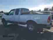 1997 Ford F-150 XL z VIN 1FTEX17L9VKB65855, wystawiony jako Copart lot #87410414 z przebiegiem 198 005 mil mil oraz Szkoda całkowita • Salvage title. Historia ofert i sprzedaży dostępna na DreamBid. Obrazek 2.