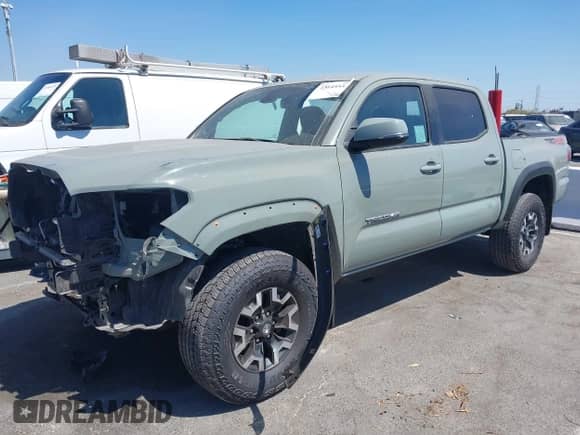 2023 Toyota Tacoma SR5 z VIN 3TMCZ5AN8PM589977, wystawiony jako IAAI lot #43145534 z przebiegiem Nie podano mil oraz . Historia ofert i sprzedaży dostępna na DreamBid. Obrazek 21.