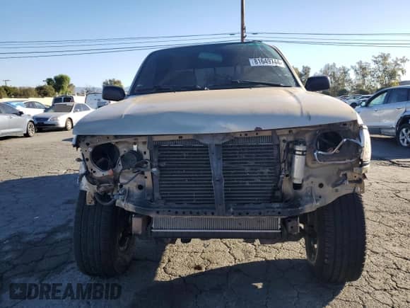 1997 Toyota Tacoma z VIN 4TAWM72NXVZ328170, wystawiony jako Copart lot #81649744 z przebiegiem 171 620 mil mil oraz Szkoda całkowita • Salvage title. Historia ofert i sprzedaży dostępna na DreamBid. Obrazek 5.