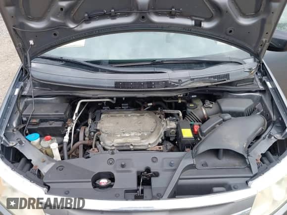 2012 Honda Odyssey EX z VIN 5FNRL5H40CB083650, wystawiony jako IAAI lot #43283741 z przebiegiem 164 693 mil mil oraz . Historia ofert i sprzedaży dostępna na DreamBid. Obrazek 10.