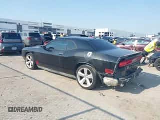 2013 Dodge Challenger R/T Plus with VIN 2C3CDYBT0DH684237, listed as a IAAI auction lot 43148120 with 133,450 mi miles and . Bid and sale history available at DreamBid. Image 3.