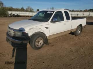 1999 Ford F-150 с VIN 1FTRX17W3XNA82872, выставлен на аукционе Copart как лот 85876295 с пробегом Не указан миль и Списание • Salvage title. История ставок и продаж доступна на DreamBid. Изображение 1.