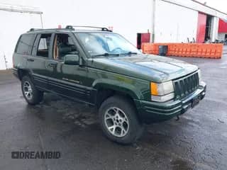 1996 Jeep Grand Cherokee Limited z VIN 1J4GZ78S0TC235692, wystawiony jako IAAI lot #41945617 z przebiegiem Nie podano mil oraz . Historia ofert i sprzedaży dostępna na DreamBid. Obrazek 1.