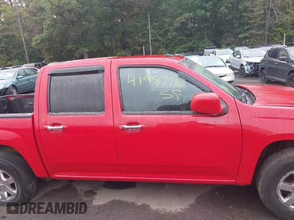 2010 Chevrolet Colorado 1LT z VIN 1GCDSCD90A8105078, wystawiony jako IAAI lot #41987710 z przebiegiem 192 779 mil mil oraz . Historia ofert i sprzedaży dostępna na DreamBid. Obrazek 13.