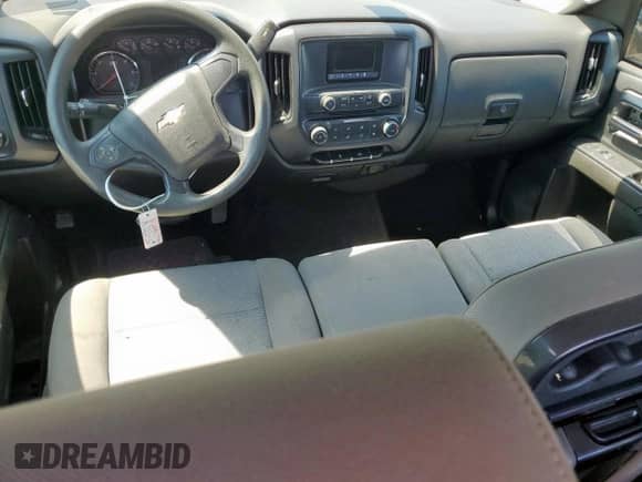 2015 Chevrolet Silverado 1500 LS z VIN 1GCRCPEHXFZ225424, wystawiony jako Copart lot #71997435 z przebiegiem Nie podano mil oraz Szkoda całkowita • Salvage title. Historia ofert i sprzedaży dostępna na DreamBid. Obrazek 8.