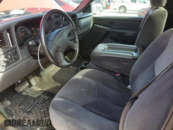 2005 GMC Sierra 1500 SLE with VIN 1GTEC14TX5Z341075, listed as a Copart auction lot 45214585 with 154,124 mi miles and Salvage title. Bid and sale history available at DreamBid. Image 8.