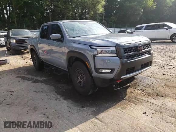 2025 Nissan Frontier Pro-X with VIN 1N6ED1EJ9SN619328, listed as a Copart auction lot 63809825 with 9,798 mi miles and Salvage title. Bid and sale history available at DreamBid. Image 14.