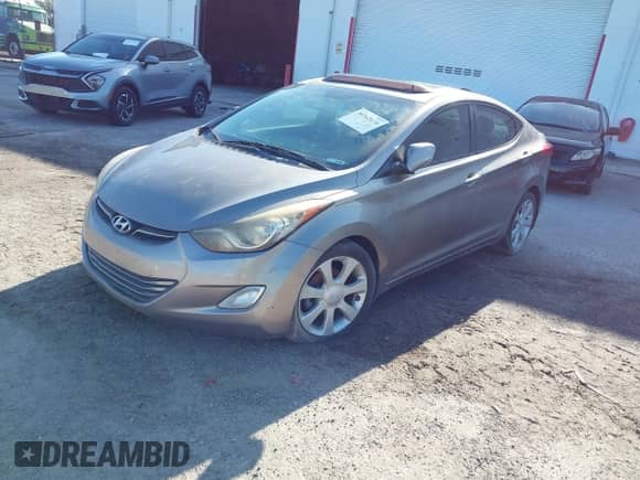 2013 Hyundai Elantra Limited with VIN 5NPDH4AE7DH298762, listed as a IAAI auction lot 39762174 with 187,066 mi miles and . Bid and sale history available at DreamBid. Image 2.