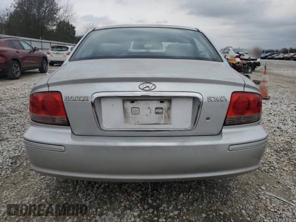 2003 Hyundai Sonata with VIN KMHWF25H53A753679, listed as a Copart auction lot 84063614 with 179,175 mi miles and Salvage title. Bid and sale history available at DreamBid. Image 6.