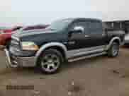 2014 Ram 1500 Laramie with VIN 1C6RR7NT4ES272420, listed as a Copart auction lot 69492355 with 82,635 mi miles and Clean title. Bid and sale history available at DreamBid. Image 1.