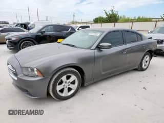 2012 Dodge Charger SE with VIN 2C3CDXBG1CH153365, listed as a Copart auction lot 67210685 with 127,914 mi miles and Salvage title. Bid and sale history available at DreamBid. Image 1.