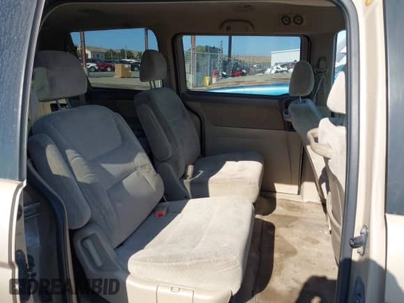 2002 Honda Odyssey LX with VIN 2HKRL18582H513684, listed as a IAAI auction lot 43008160 with 320,191 mi miles and . Bid and sale history available at DreamBid. Image 8.