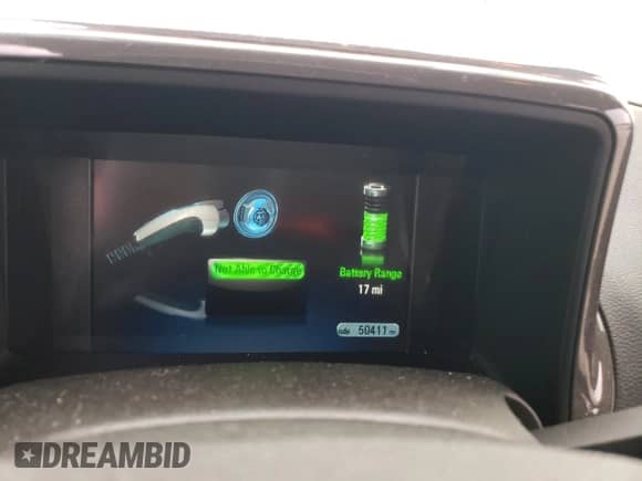 2015 Chevrolet Volt z VIN 1G1RD6E49FU142173, wystawiony jako Copart lot #69082893 z przebiegiem 50 411 mil mil oraz . Historia ofert i sprzedaży dostępna na DreamBid. Obrazek 9.