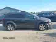 2014 Dodge Journey SE with VIN 3C4PDDAG5ET279249, listed as a IAAI auction lot 43113809 with 205,829 mi miles and . Bid and sale history available at DreamBid. Image 13.