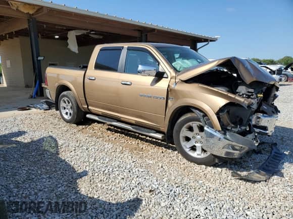 2012 Ram 1500 Laramie z VIN 1C6RD6NT9CS232971, wystawiony jako Copart lot #52209405 z przebiegiem 115 422 mil mil oraz Szkoda całkowita • Salvage title. Historia ofert i sprzedaży dostępna na DreamBid. Obrazek 4.