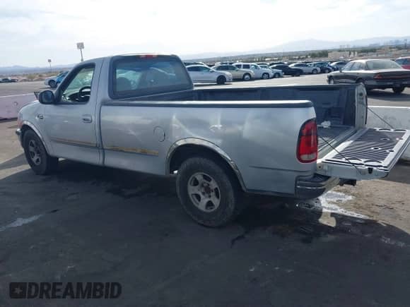 1997 Ford F-150 с VIN 1FTEF17W3VLA19510, выставлен на аукционе IAAI как лот 41711010 с пробегом 214 984 миль миль и . История ставок и продаж доступна на DreamBid. Изображение 3.