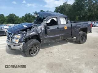 2014 Chevrolet Silverado 1500 LT with VIN 1GCVKREH7EZ137040, listed as a Copart auction lot 64623535 with 75,227 mi miles and Salvage title. Bid and sale history available at DreamBid. Image 1.