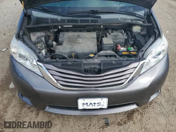 2015 Toyota Sienna LE with VIN 5TDKK3DC8FS601042, listed as a Copart auction lot 70295345 with 134,973 mi miles and Clean title. Bid and sale history available at DreamBid. Image 12.
