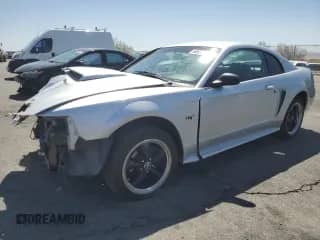 2001 Ford Mustang GT Deluxe с VIN 1FAFP42X81F244295, выставлен на аукционе Copart как лот 60635175 с пробегом Не указан миль и Списание • Salvage title. История ставок и продаж доступна на DreamBid. Изображение 1.