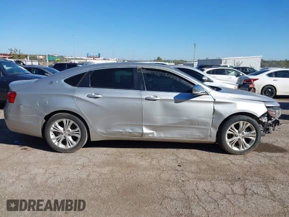 2015 Chevrolet Impala LT with VIN 2G1125S30F9108144, listed as a IAAI auction lot 43450694 with 216,503 mi miles and . Bid and sale history available at DreamBid. Image 14.