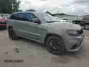 2021 Jeep Grand Cherokee Trackhawk z VIN 1C4RJFN96MC659042, wystawiony jako Copart lot #65164445 z przebiegiem 9 356 mil mil oraz Czysty tytuł • Clean title. Historia ofert i sprzedaży dostępna na DreamBid. Obrazek 4.