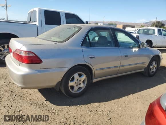 1999 Honda Accord EX with VIN 1HGCG1654XA010134, listed as a Copart auction lot 67599455 with 263,752 mi miles and Salvage title. Bid and sale history available at DreamBid. Image 3.