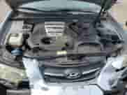 2007 Hyundai Sonata SE z VIN 5NPEU46F17H206065, wystawiony jako Copart lot #84860935 z przebiegiem 168 120 mil mil oraz Szkoda całkowita • Salvage title. Historia ofert i sprzedaży dostępna na DreamBid. Obrazek 11.