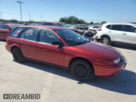 1998 Saturn SW with VIN 1G8ZK8275WZ300870, listed as a Copart auction lot 73472674 with 36,550 mi miles and Salvage title. Bid and sale history available at DreamBid. Image 4.