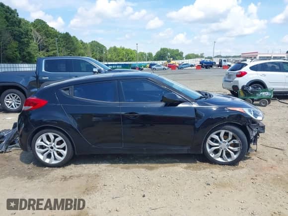 2012 Hyundai Veloster w/Black Int с VIN KMHTC6AD0CU056828, выставлен на аукционе IAAI как лот 42611623 с пробегом 136 242 миль миль и . История ставок и продаж доступна на DreamBid. Изображение 14.