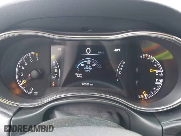 2021 Jeep Grand Cherokee 80th Anniversary z VIN 1C4RJFBGXMC621817, wystawiony jako IAAI lot #41519733 z przebiegiem 60 552 mil mil oraz . Historia ofert i sprzedaży dostępna na DreamBid. Obrazek 7.