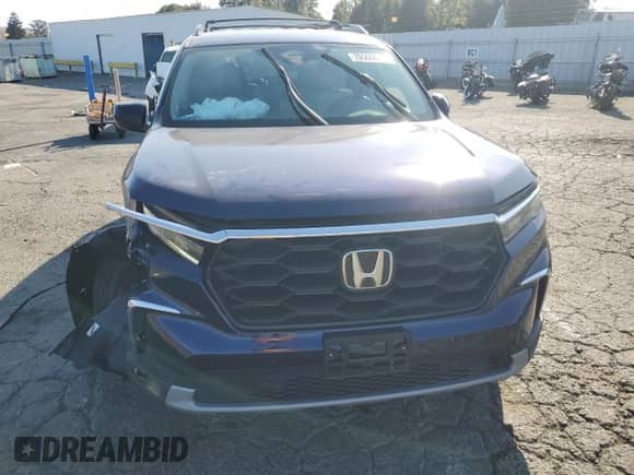 2025 Honda Pilot EX-L с VIN 5FNYG2H47SB016542, выставлен на аукционе Copart как лот 70500615 с пробегом 11 862 миль миль и Списание • Salvage title. История ставок и продаж доступна на DreamBid. Изображение 5.