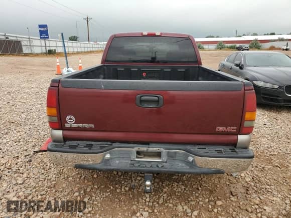2000 GMC Sierra 1500 SLE with VIN 2GTEC19V3Y1296875, listed as a Copart auction lot 66842935 with 100,494 mi miles and Clean title. Bid and sale history available at DreamBid. Image 6.