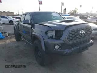 2021 Toyota Tacoma SR5 z VIN 3TMDZ5BN2MM108586, wystawiony jako IAAI lot #41604953 z przebiegiem 65 422 mil mil oraz . Historia ofert i sprzedaży dostępna na DreamBid. Obrazek 1.