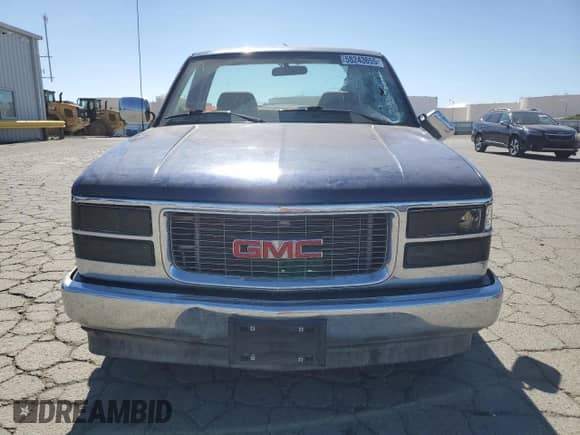 1994 GMC Sierra 1500 with VIN 1GTDC14Z8RZ554211, listed as a Copart auction lot 58243655 with 163,522 mi miles and Salvage title. Bid and sale history available at DreamBid. Image 5.