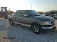 2002 Ford F-150 XLT с VIN 1FTRW07L12KC05808, выставлен на аукционе Copart как лот 80760845 с пробегом 258 794 миль миль и Списание • Salvage title. История ставок и продаж доступна на DreamBid. Изображение 13.